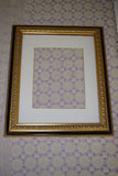 Frame, brass with black accents ornate