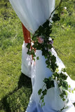 Floral Silks with Greenery Garland and Fabric Arbor Decor
